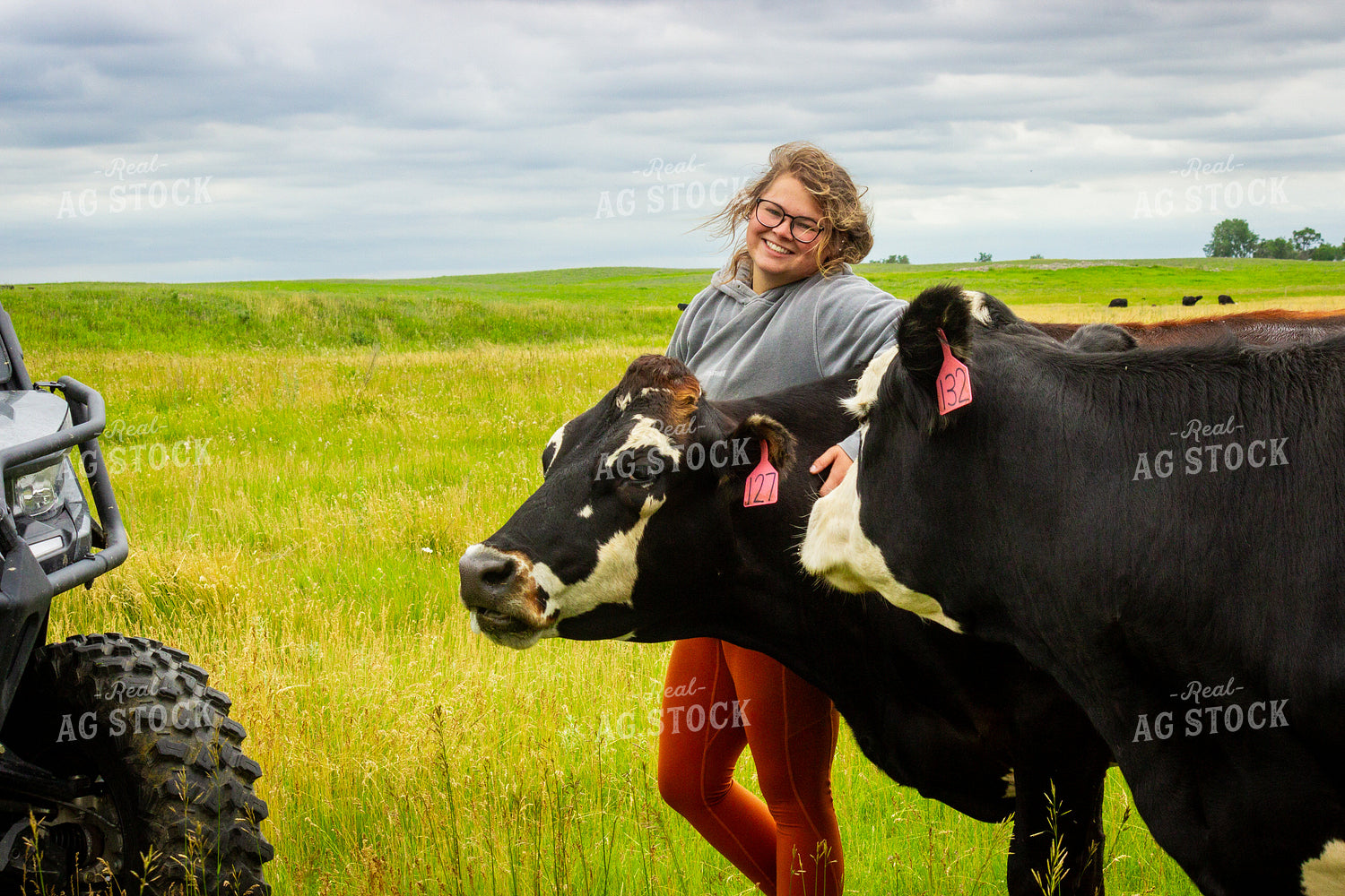 Female Farmer with Angus Cows 155255