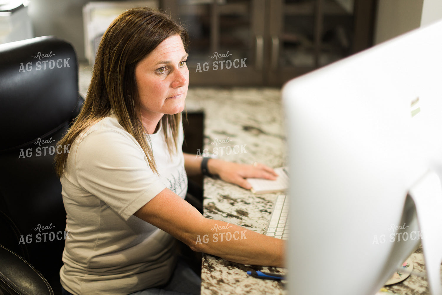 Woman Farmer Works on Computer in Office 7504