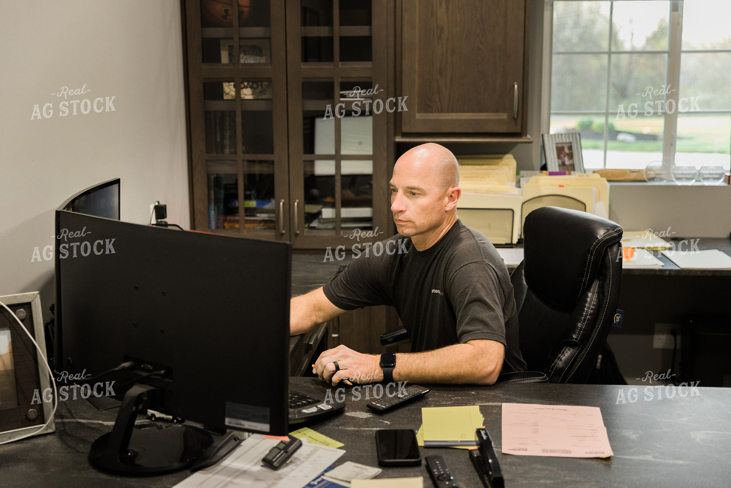 Farmer Works on Computer in Office 7491