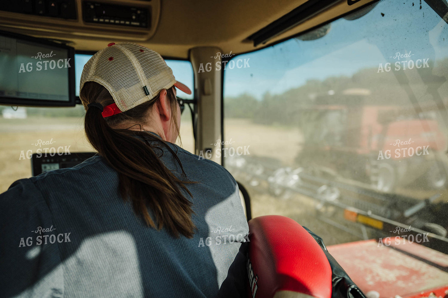 Female Farmer Driving Tractor 115218