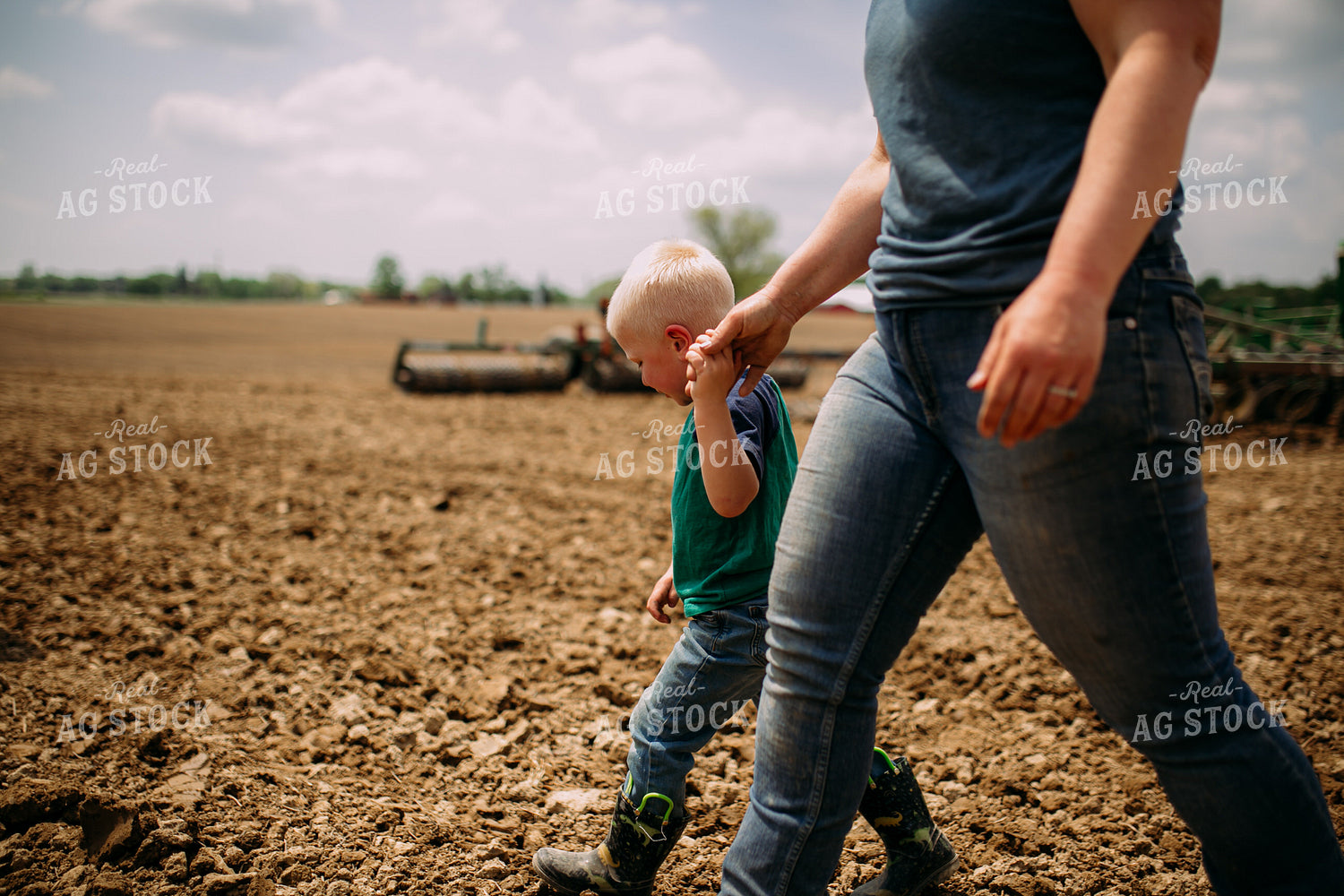 Farm Family Walking by Tractor 169084
