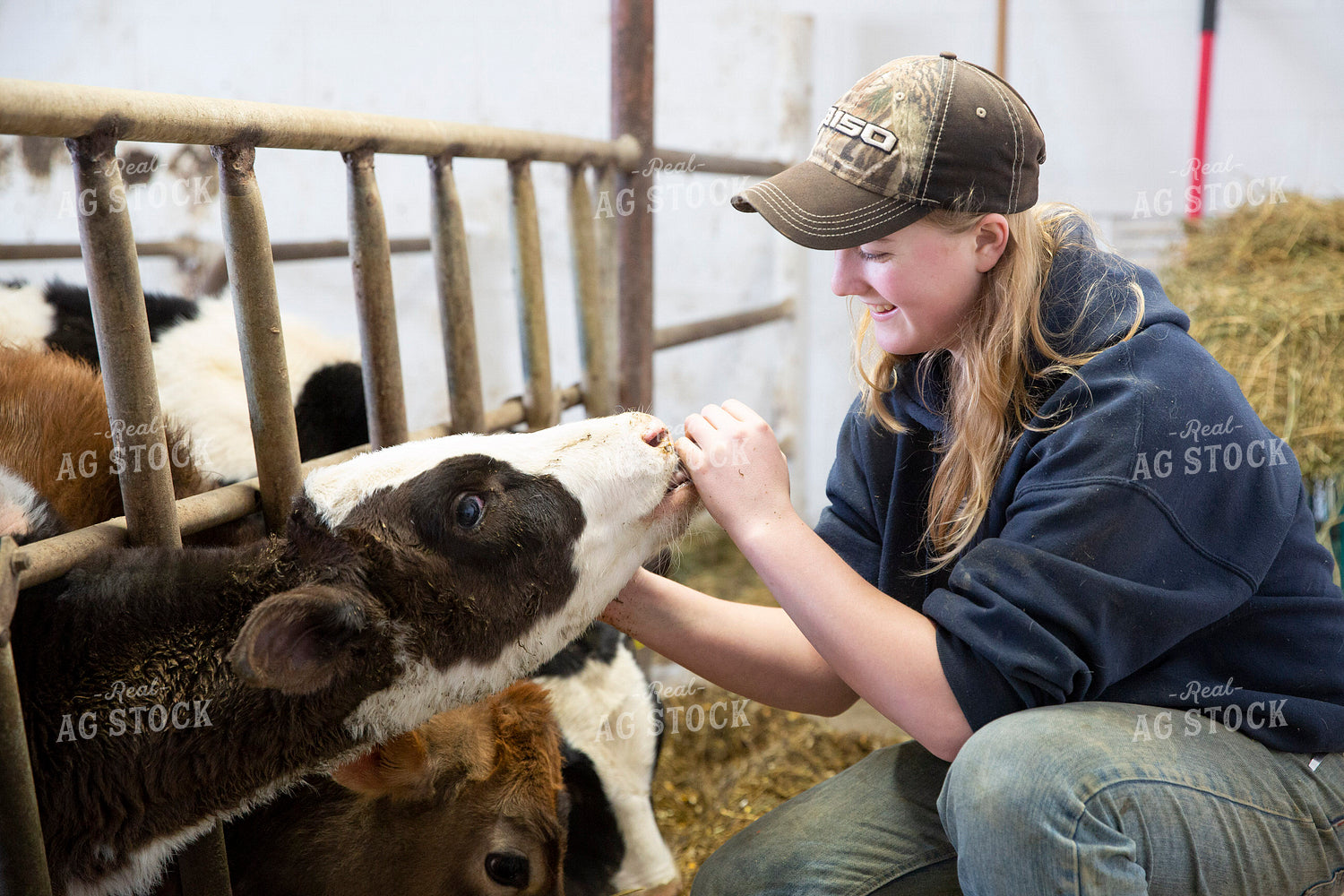 Female Dairy Farmer with Calf 55039