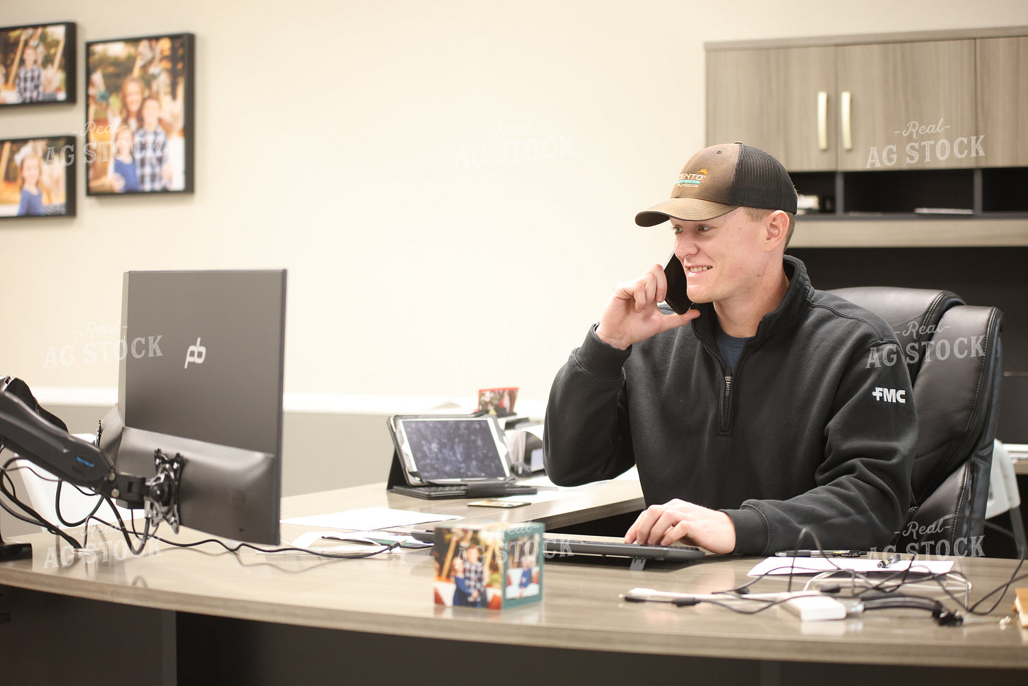 Farmer on Phone in Office 161113