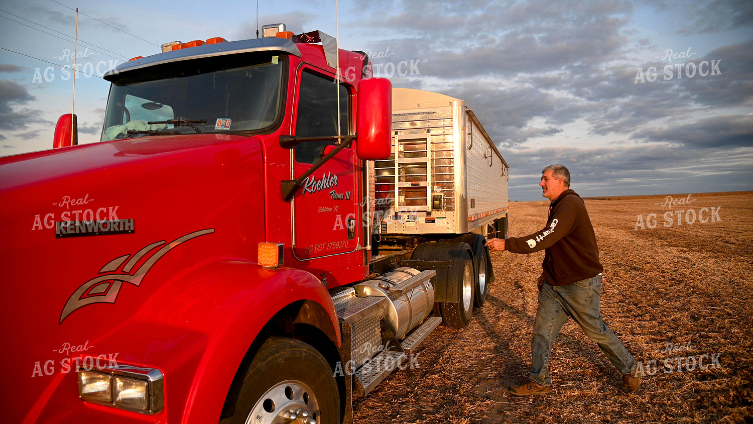 Farmer Climbing into Semi Cab 25732