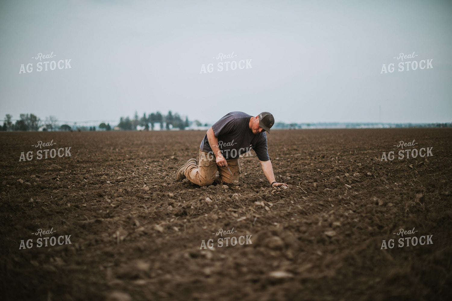Farmer Checking Seed Depth 5676