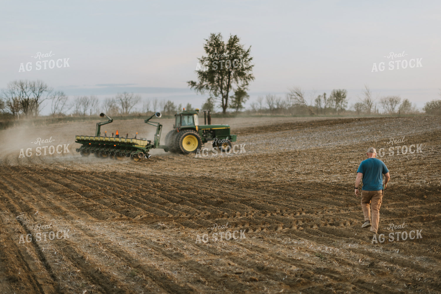 Farmer Walking Towards Planter 7461