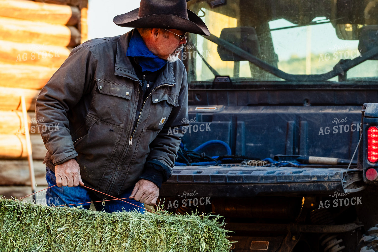 Rancher Loading Straw 163007