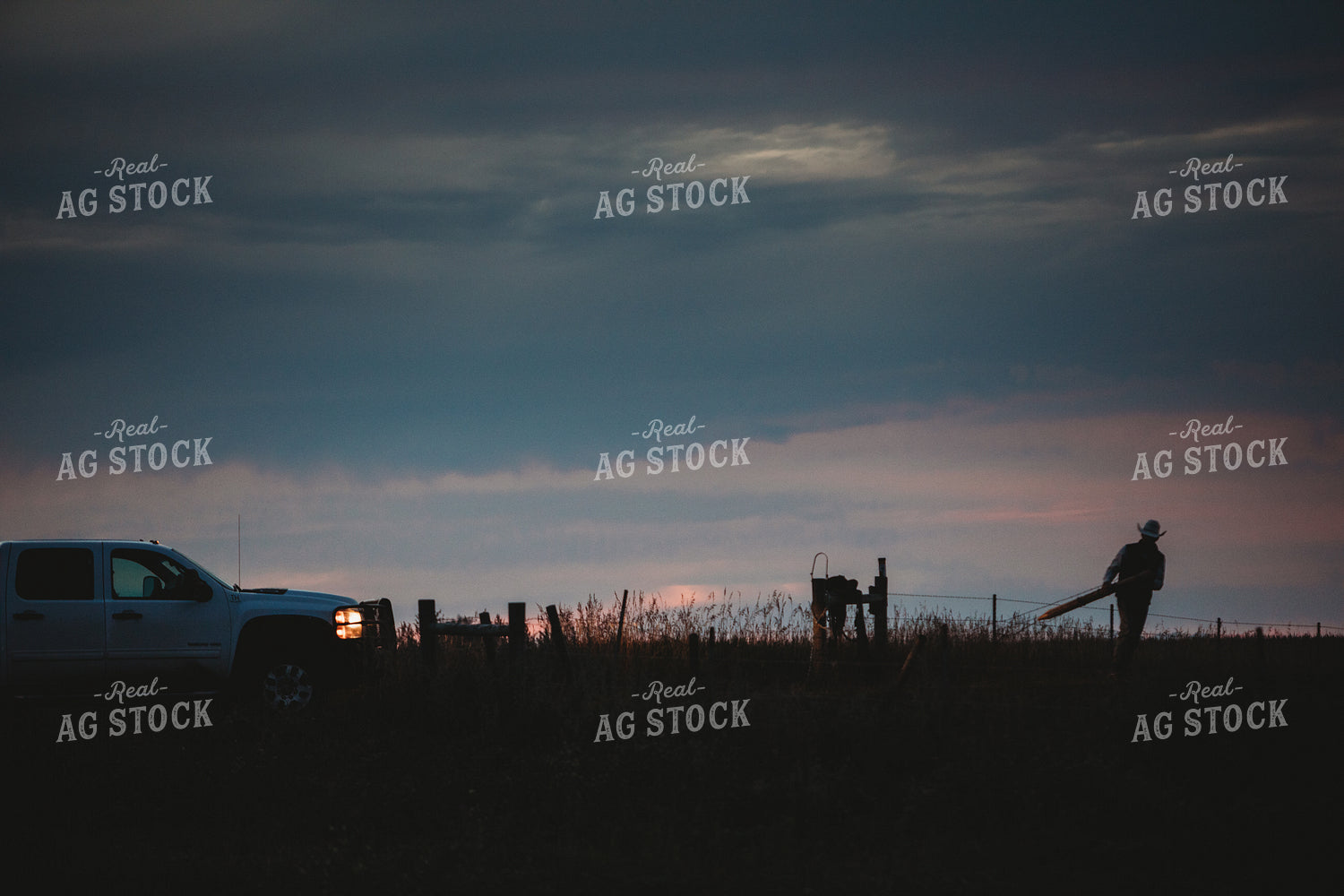 Rancher Working in Pasture at Dusk 6438