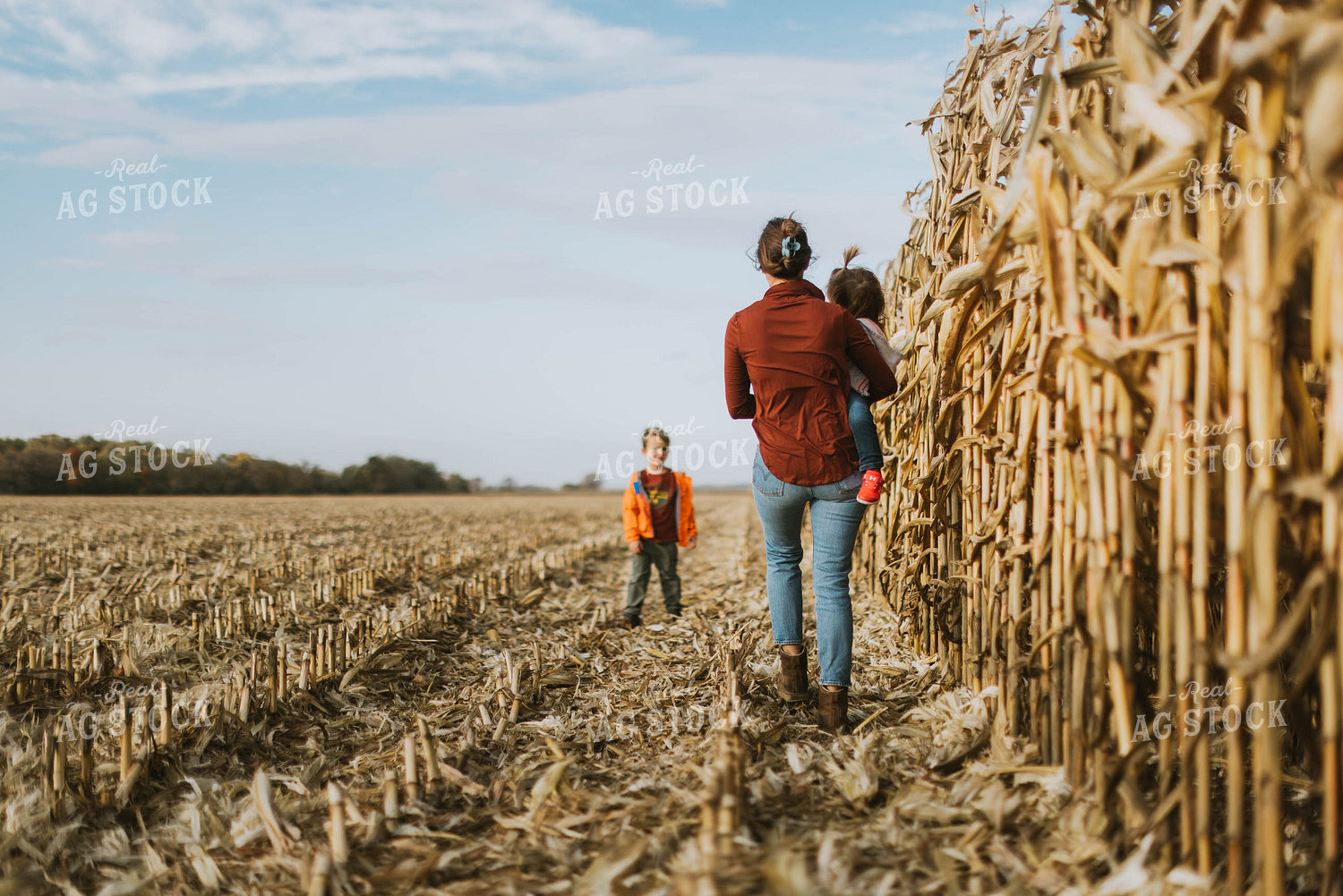 Female Farmer and Kids Checking Corn 8513
