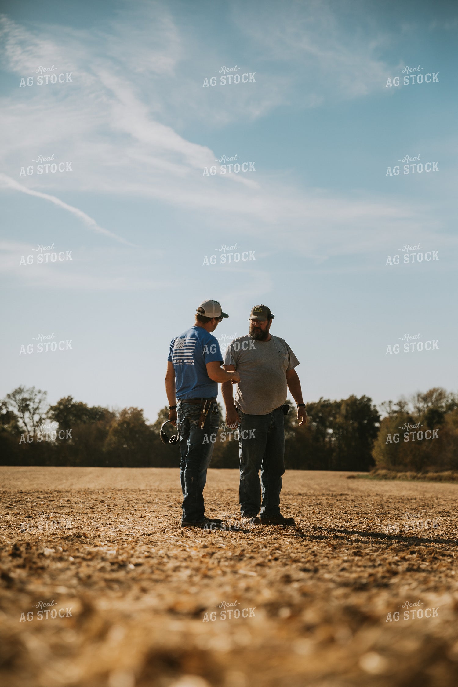 Farmers Talking in Field 7080