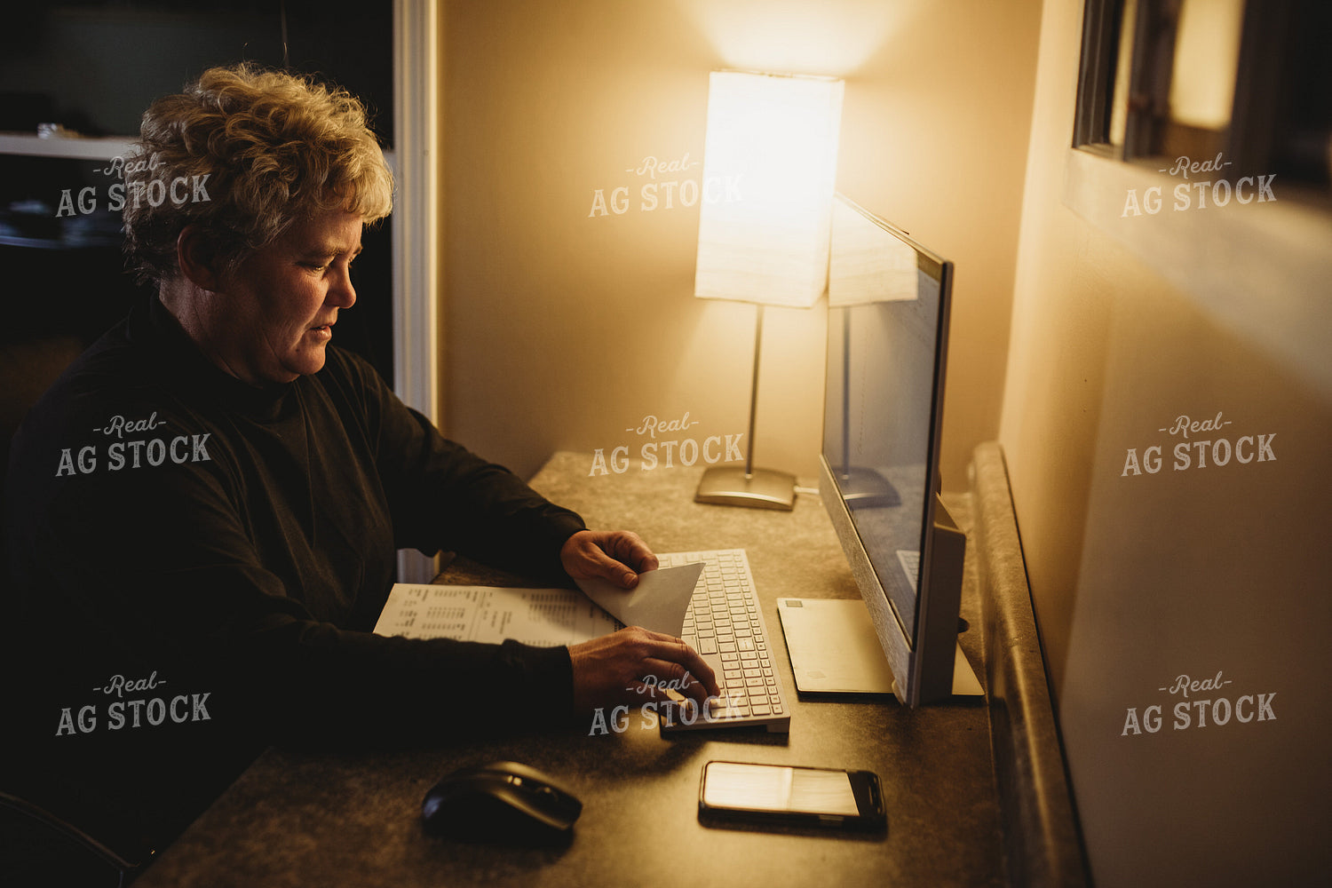 Farmer Using Computer for Farm Accounting 3710