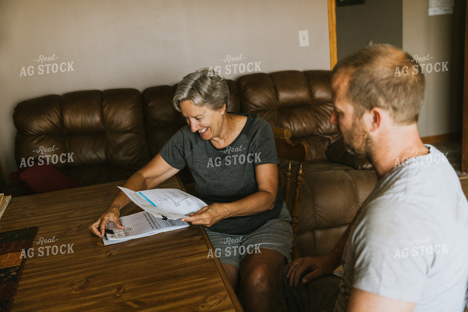 Farm Family Doing Bookwork 8114