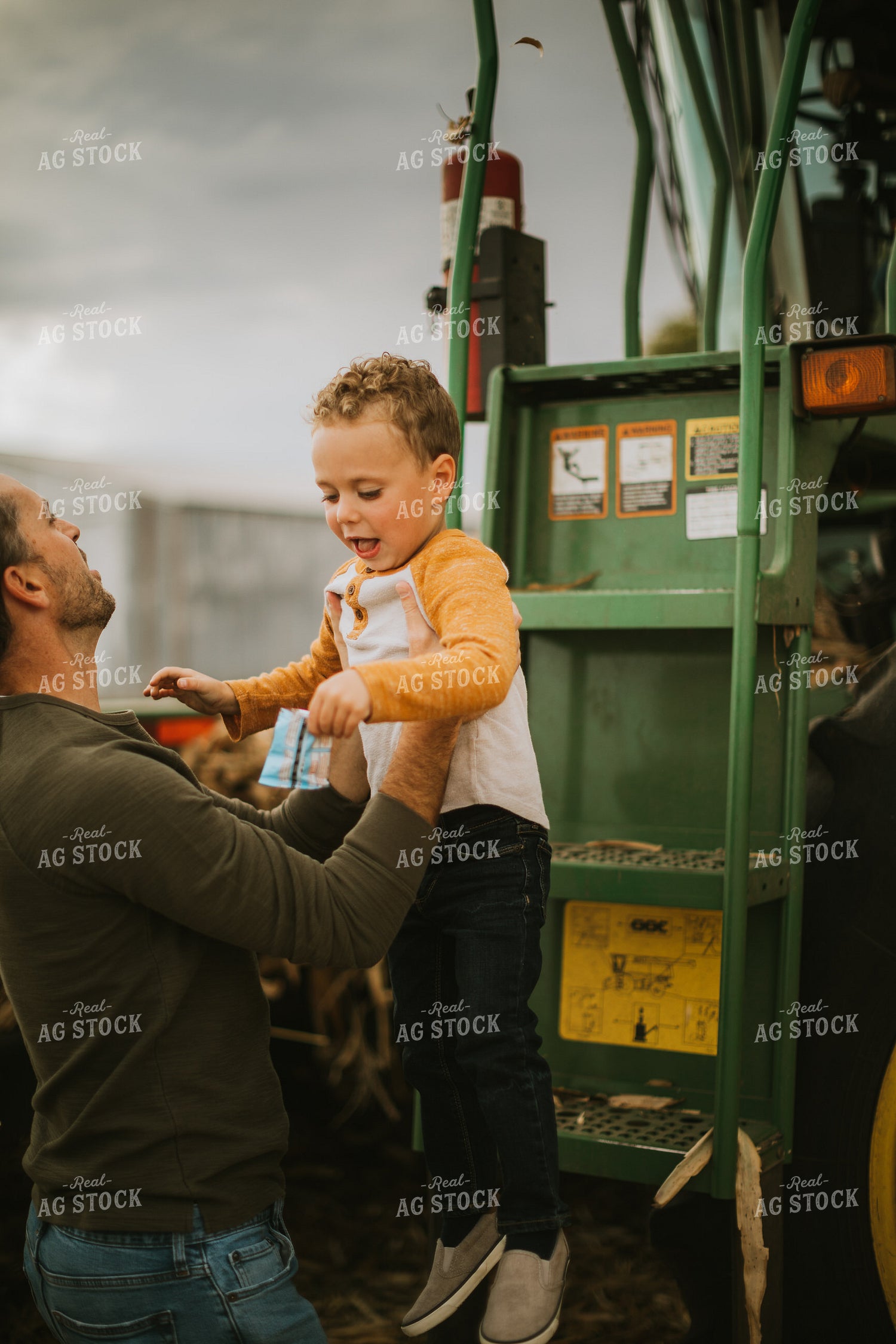 Farm Kid Getting out of Combine 6615