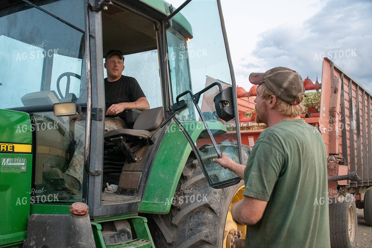 Farmer in Tractor Talking to Farmer 50262