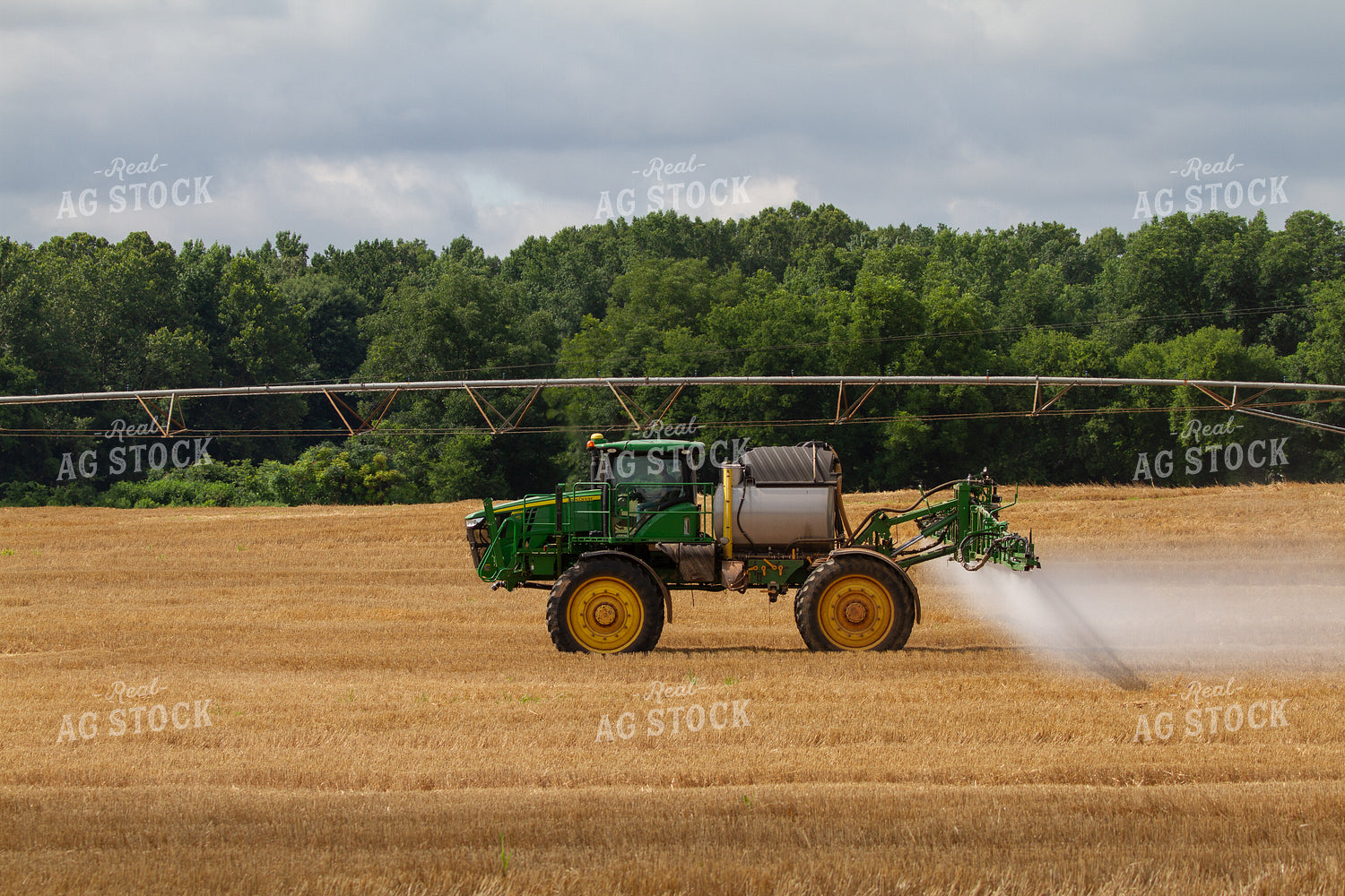 Sprayer in Harvested Wheat Field 79072
