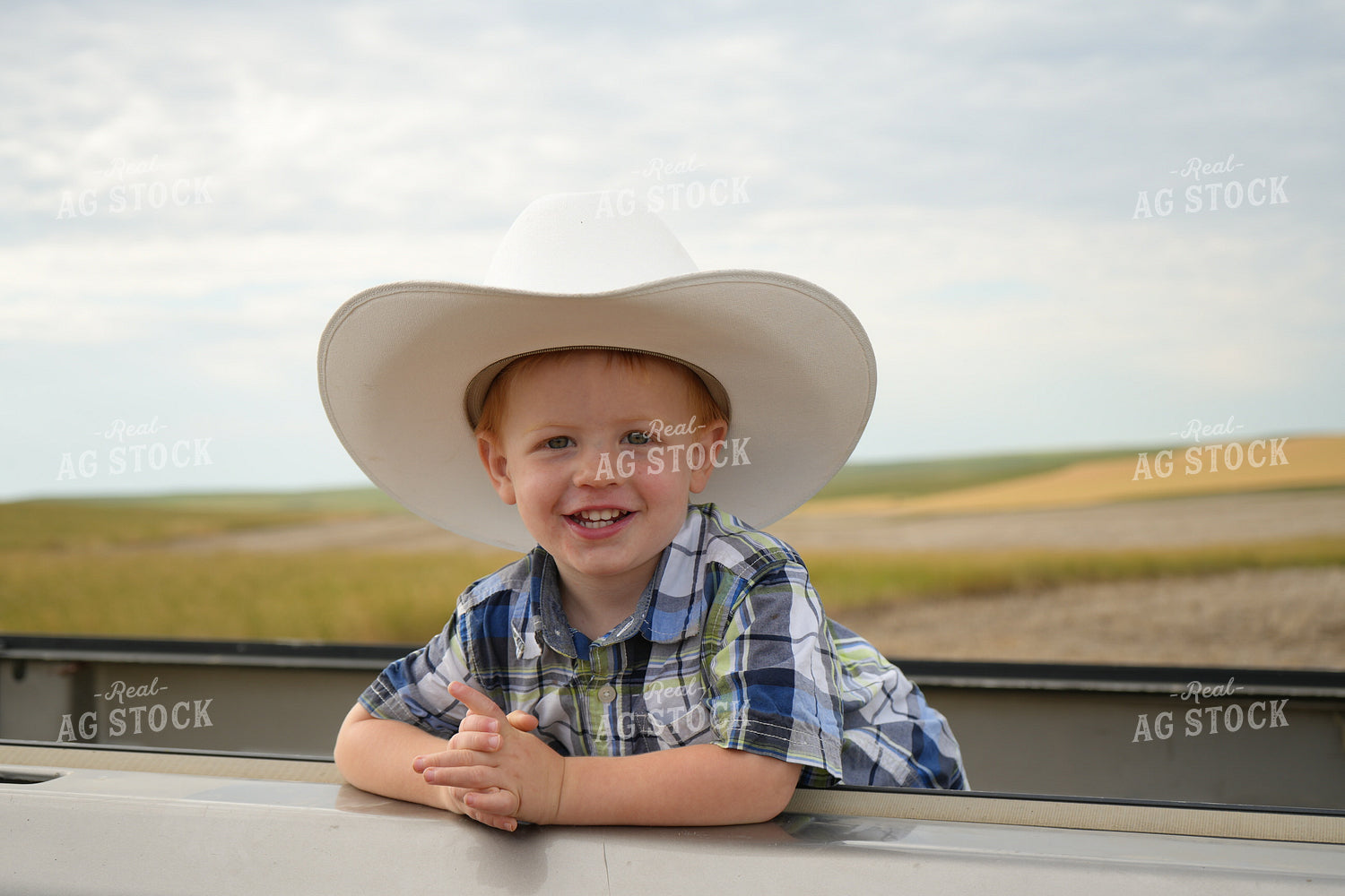 Farm Kid Wearing Hat 95000