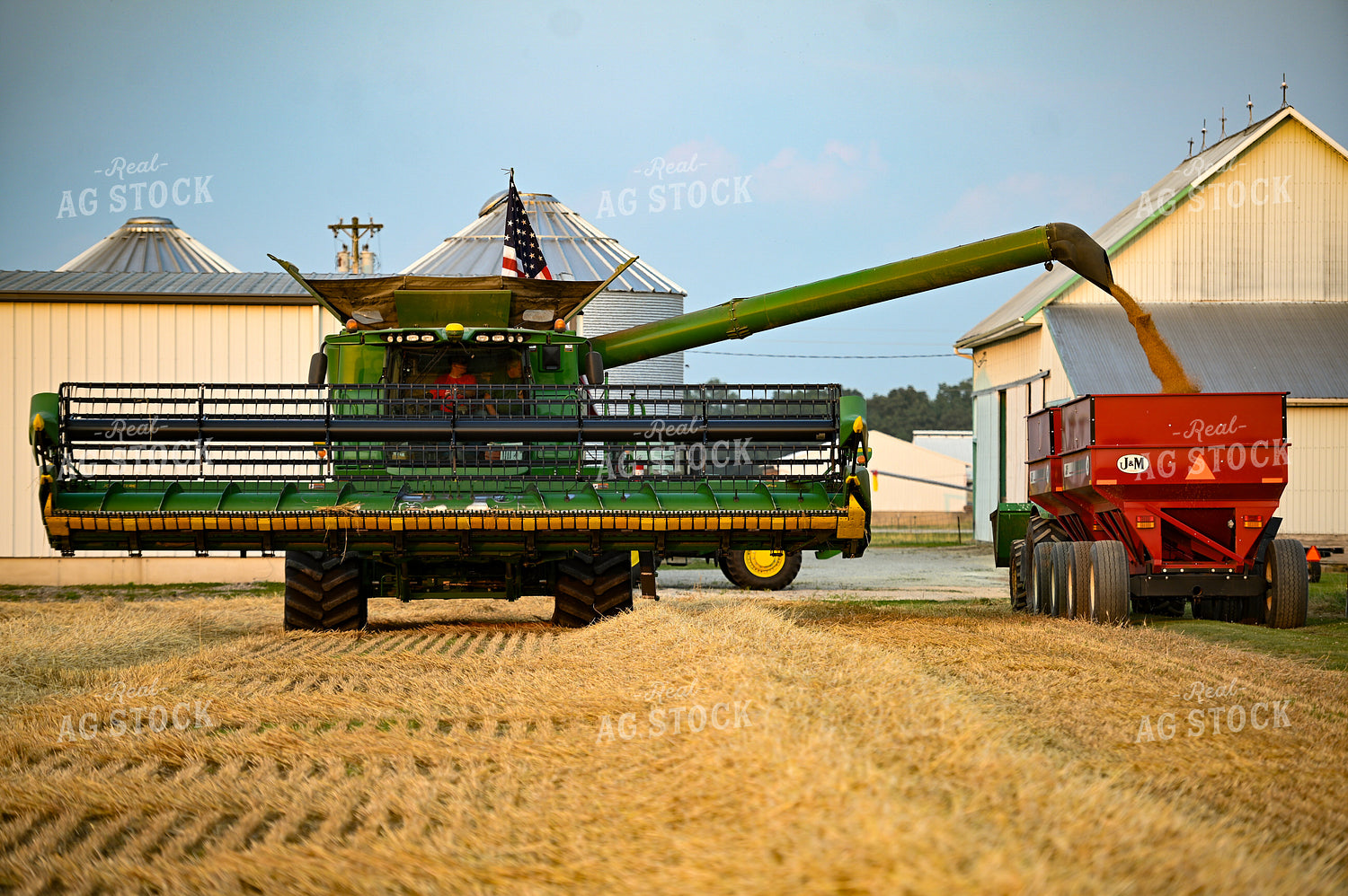 Combine Unloading Wheat into Wagon 90037