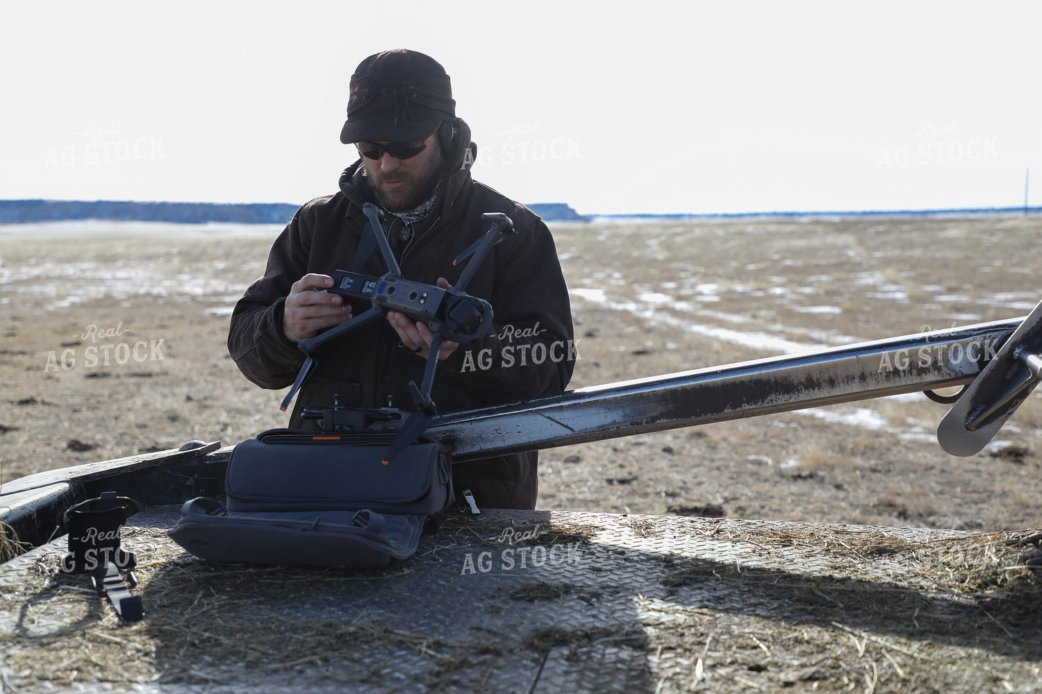 Farmer Setting Up Drone 117013