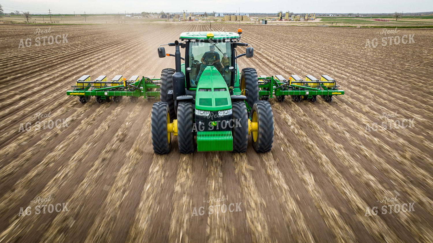 Farm Kid Sits in Buddy Seat While Planting Field 56636