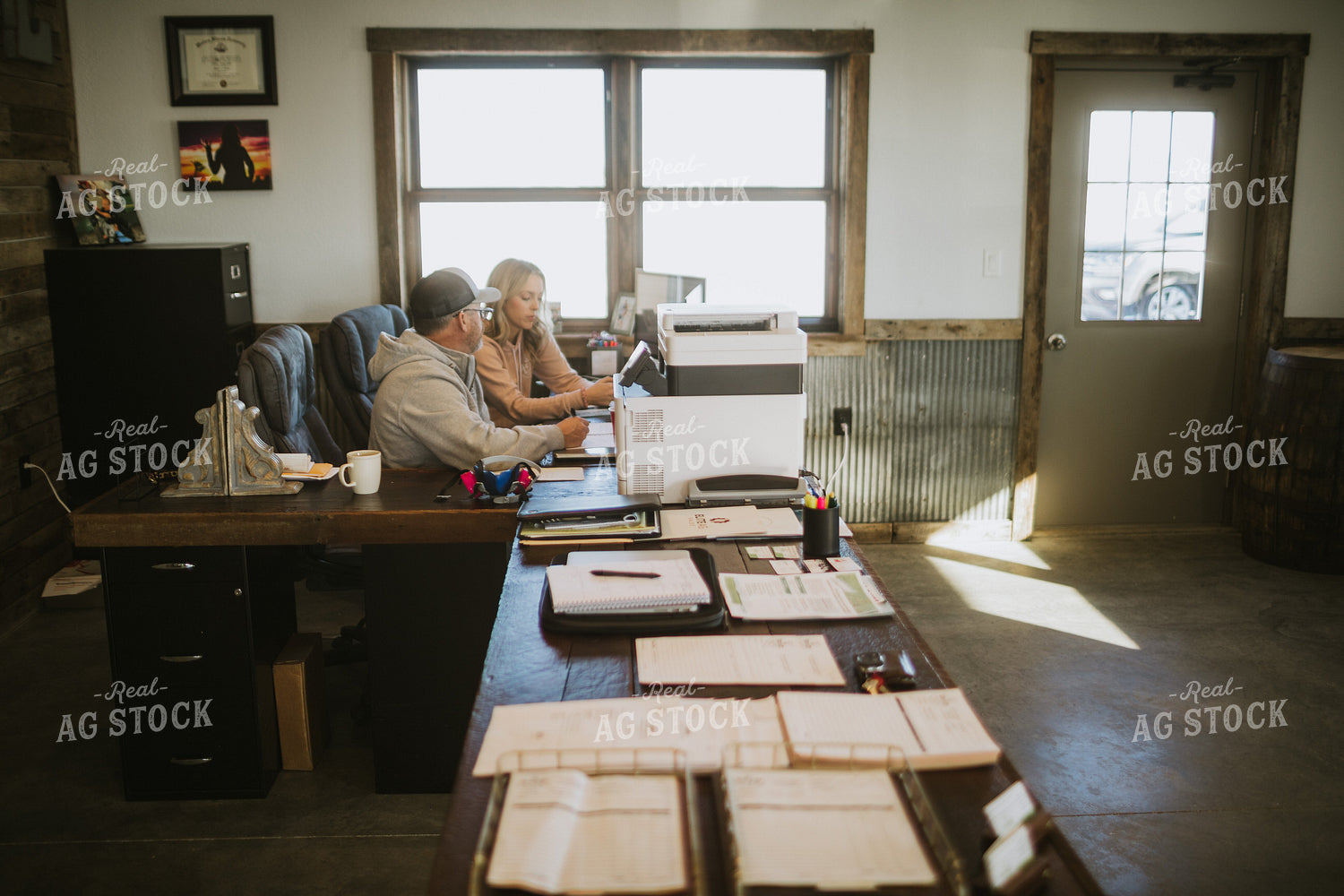 Man and Woman Going Over Paperwork 5295