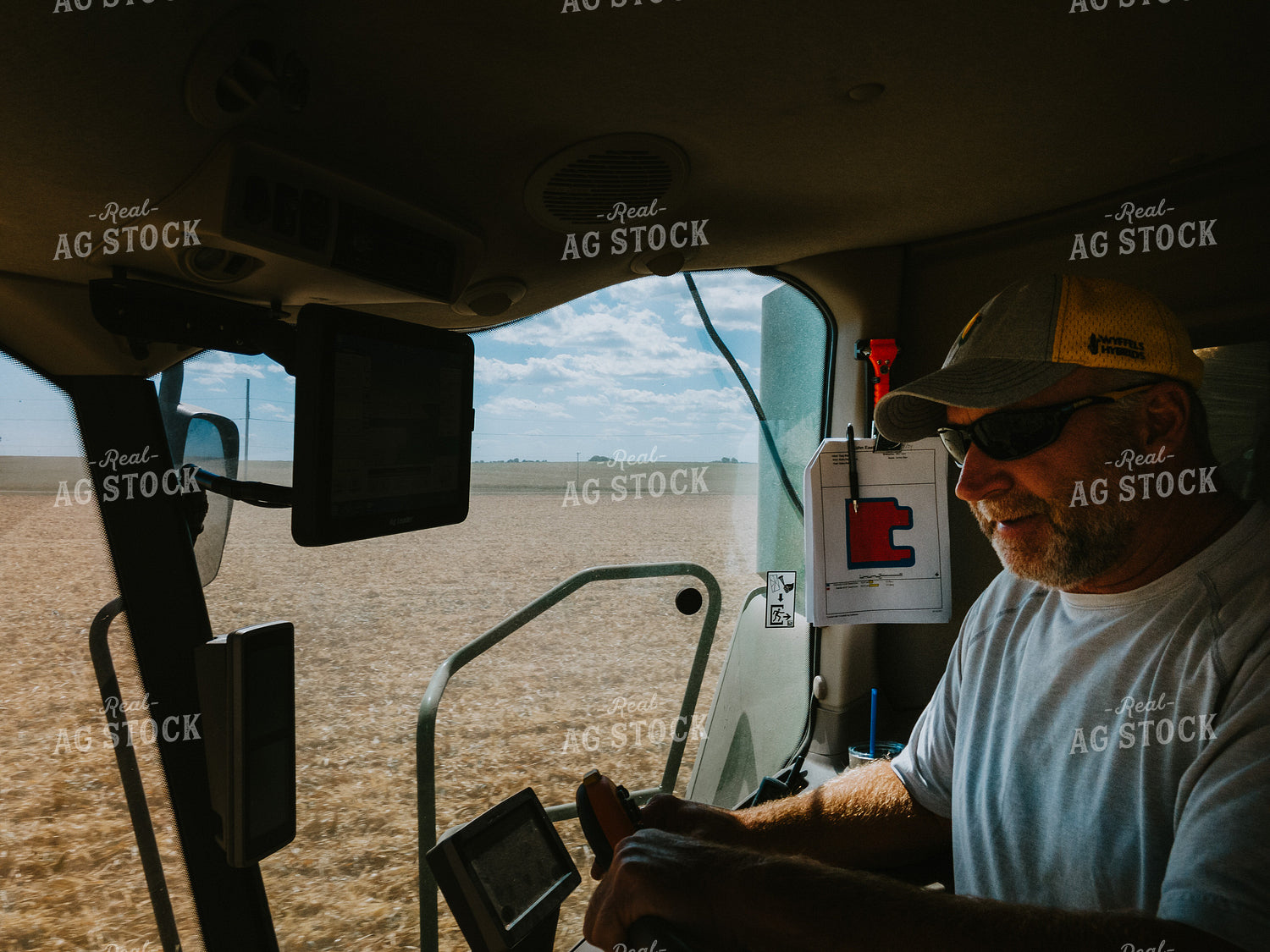 Farmer in Combine Cab 4648