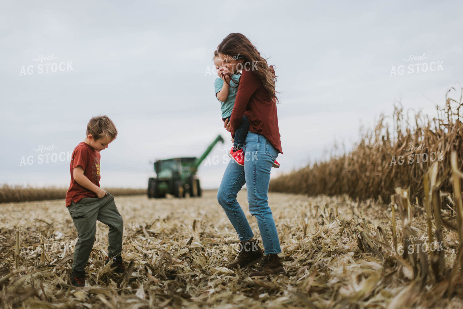 Female Farmer and Kids Walking Away from Tractor 8611
