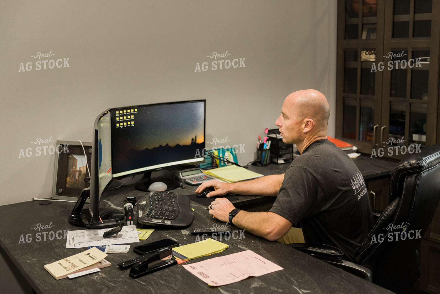 Farmer Works on Computer in Office 7490