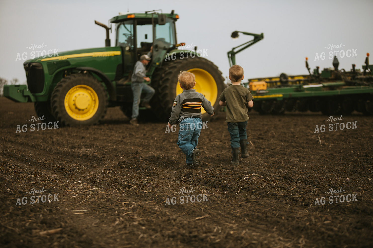 Farm Kids Running to Farmer in Field at Planting 5460