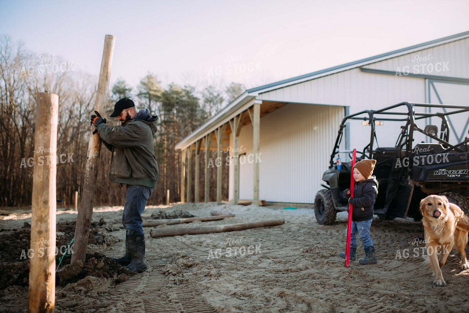 Farm Family Putting up Fence 169052