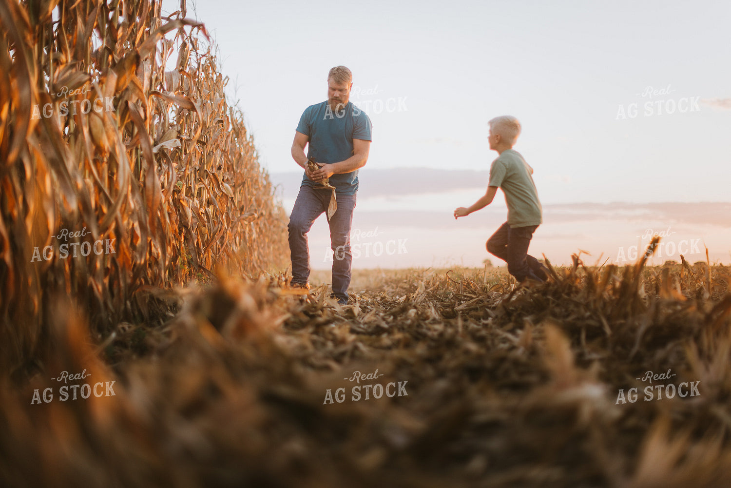 Farmer Checking Corn with Kid 9395
