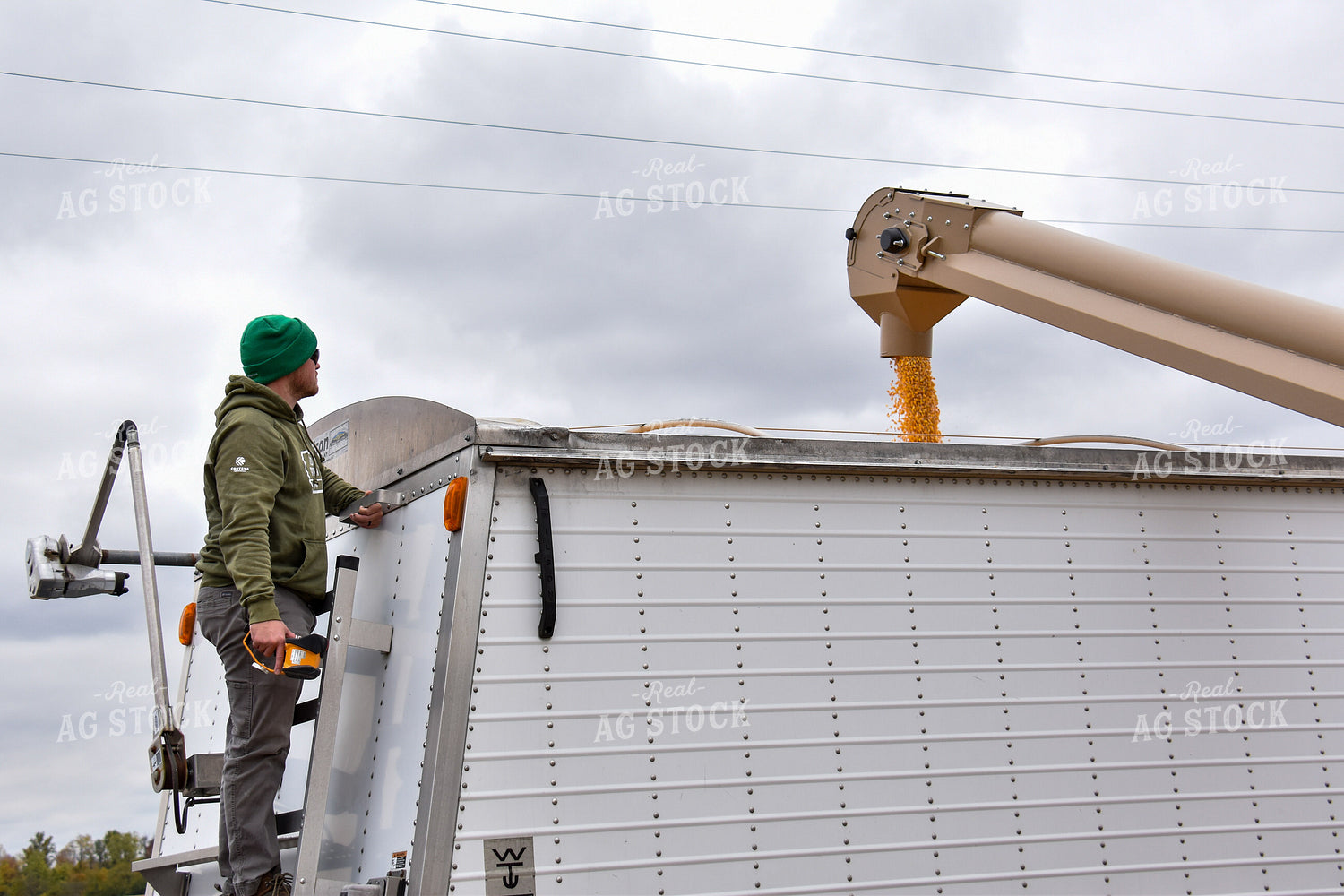 Farmer Watching Truck Fill 84205