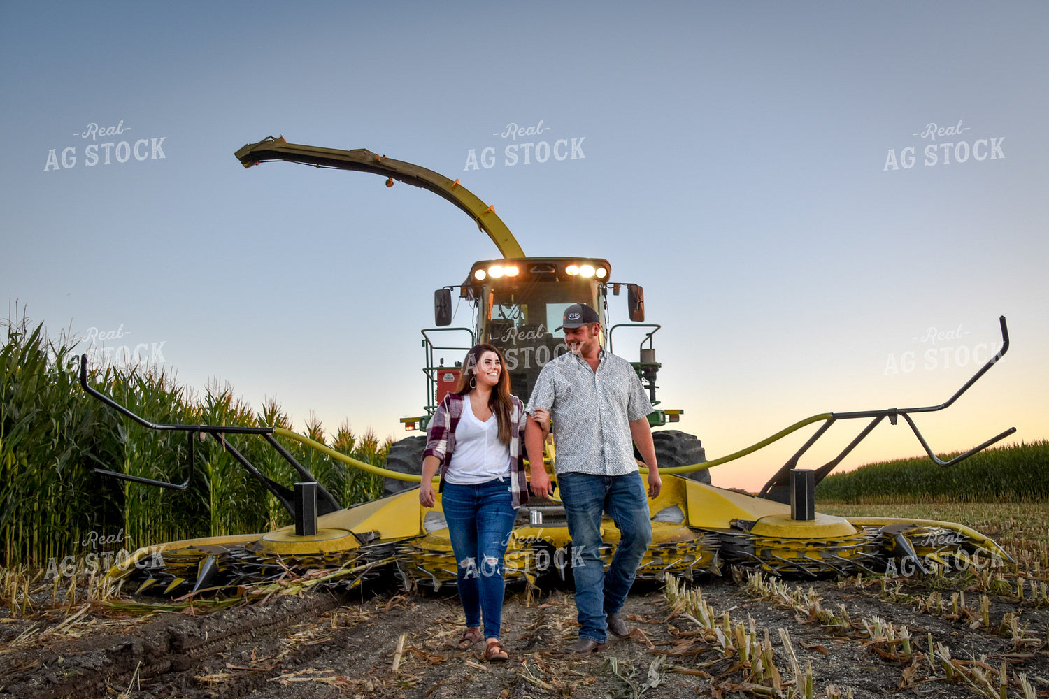 Farmers in Front of Forage Harvester 56552