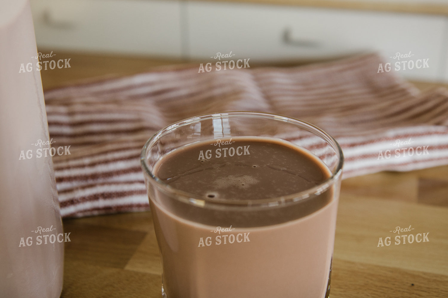 Chocolate Milk in Glass on Kitchen Countertop 67330