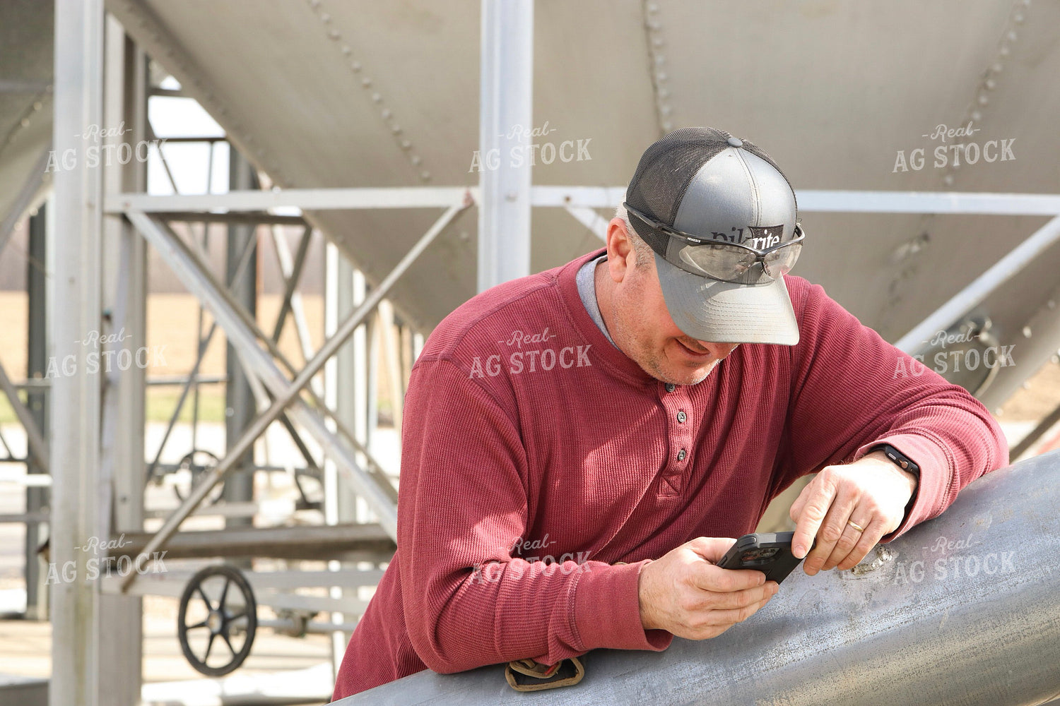 Farmer using Phone 109117