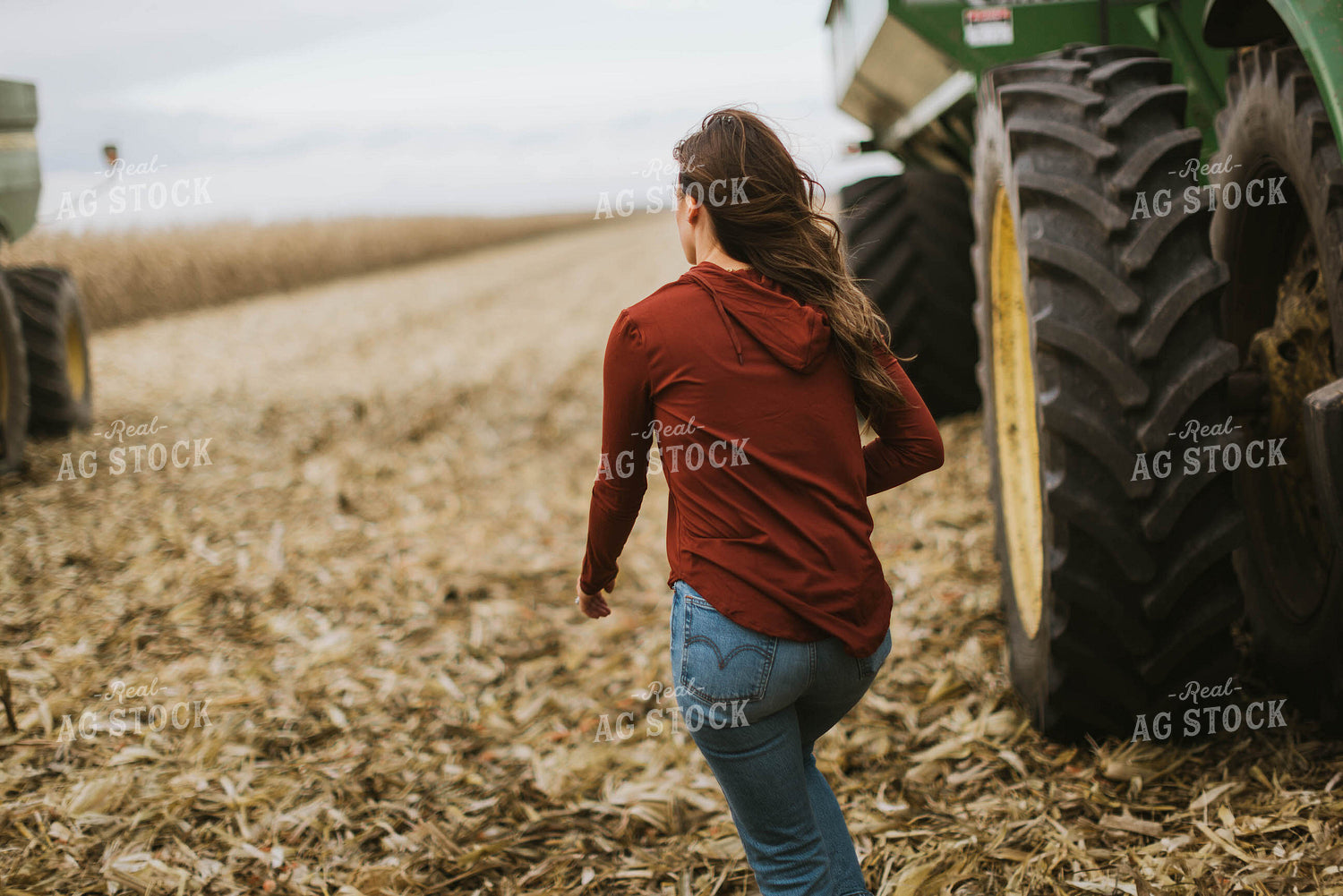 Female Farmer Walking to Combine 8557