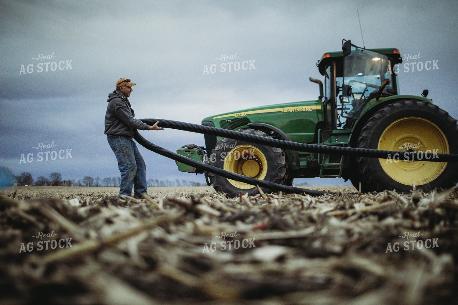 Farmer Laying Out Tile for Tile Plow 3698