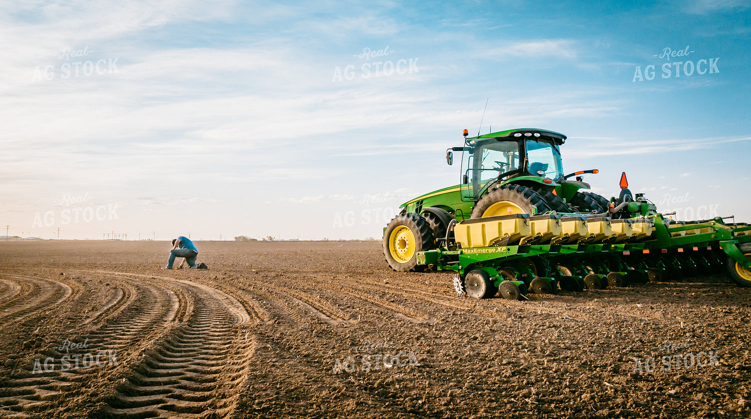 Farmer Touching Soil 56588