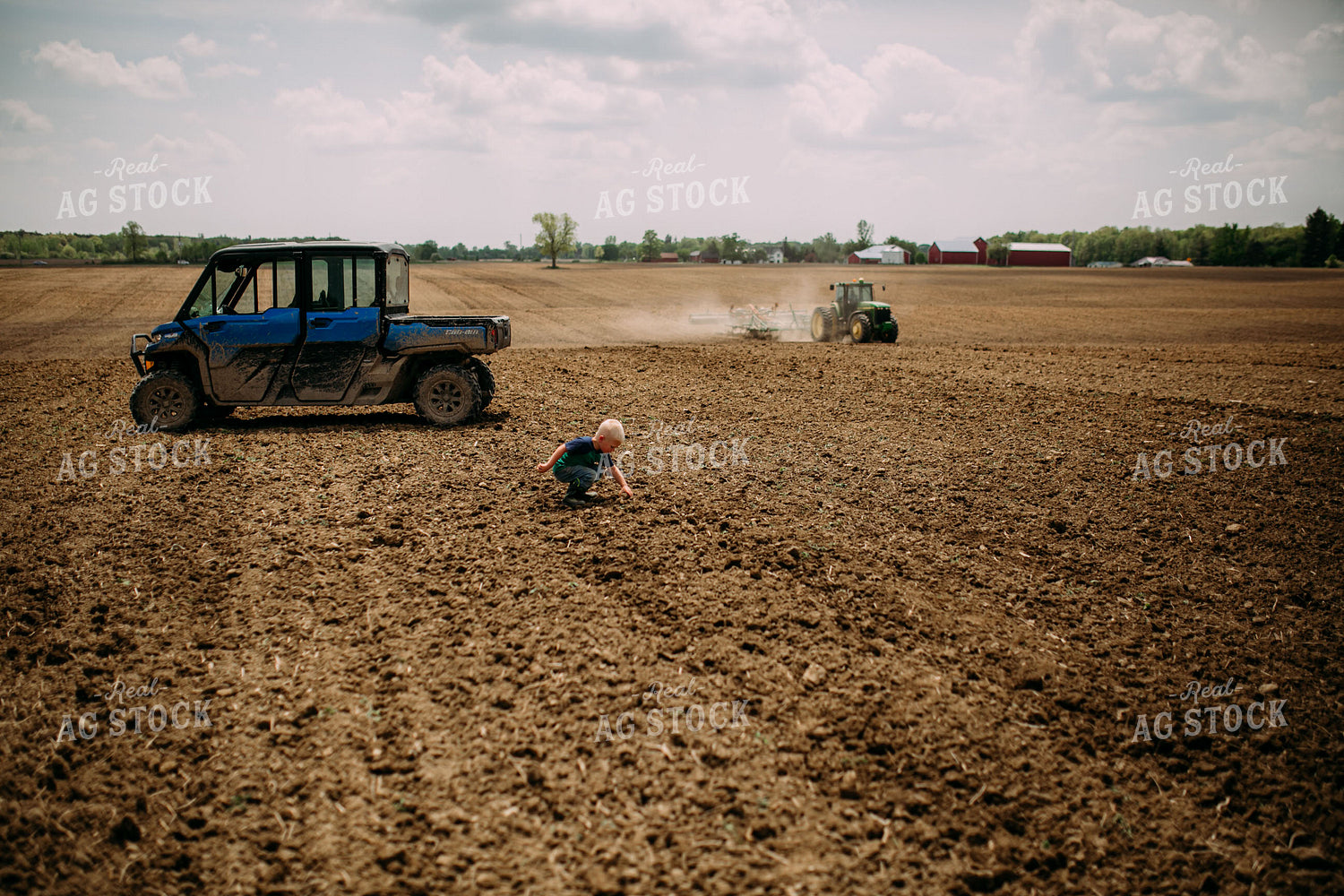 Farm Kid and Mom Picking Up Rocks 169097