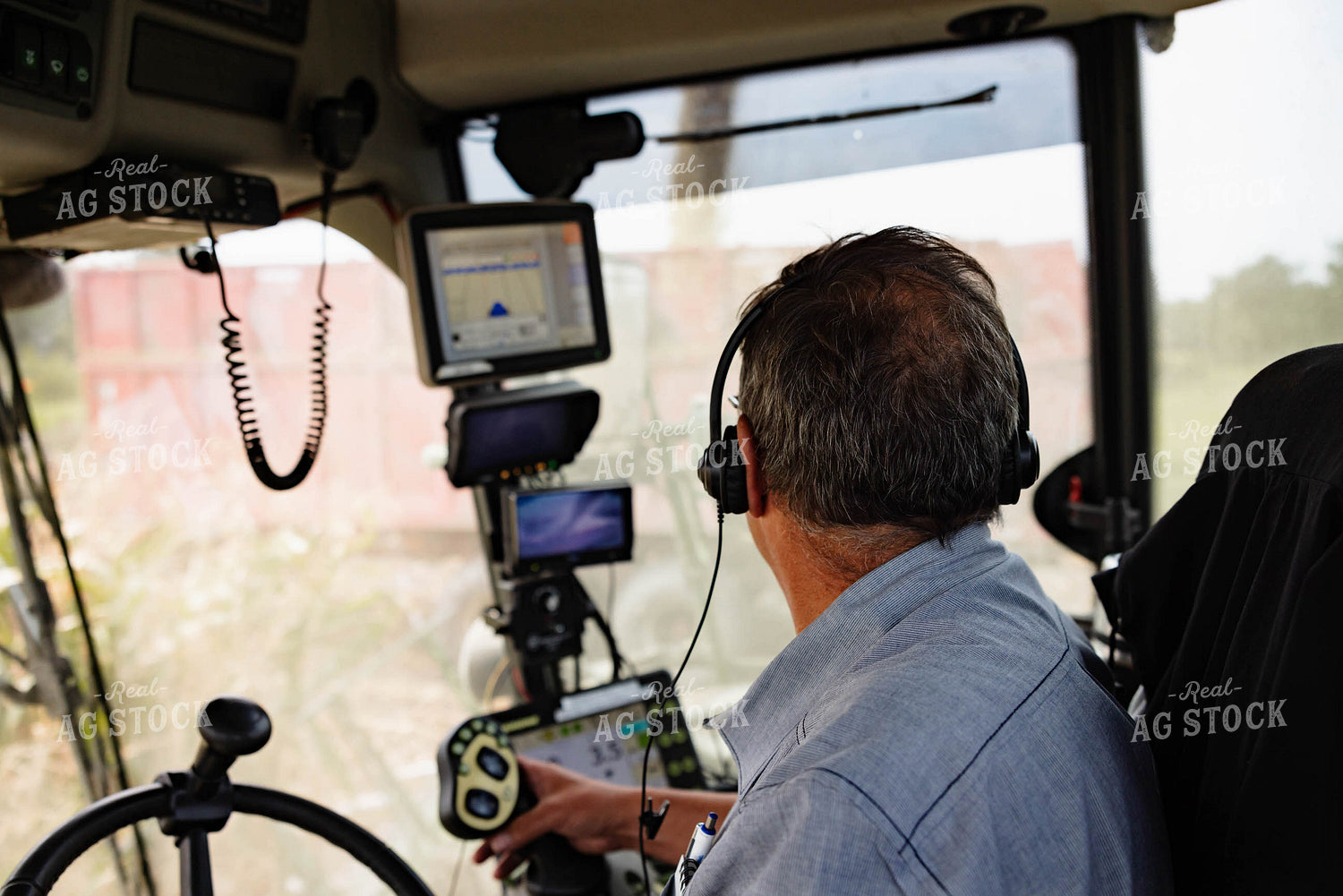 Farmer in Combine Cab 152279