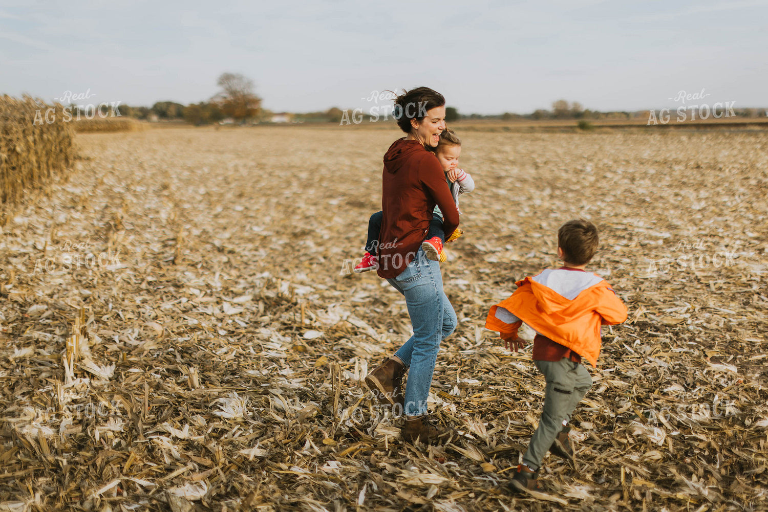 Female Farmer and Kids Playing in Cornfield 8523