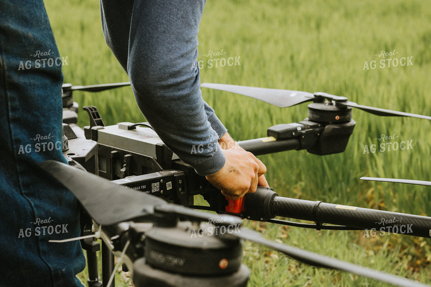 Farmer Prepares Drone for Flight 101040