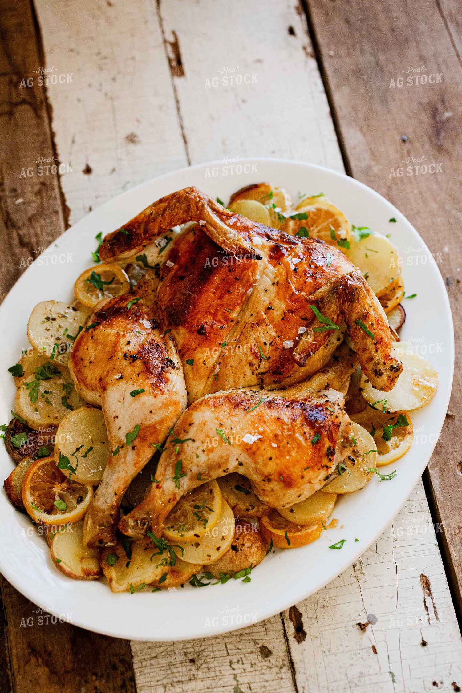 Roasted Whole Chicken on Bed of Potatoes 134029