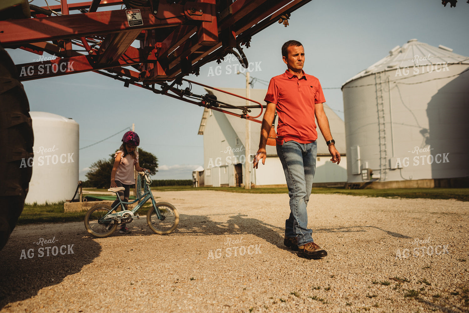 Farmer Checking Sprayer Nozzles 4452