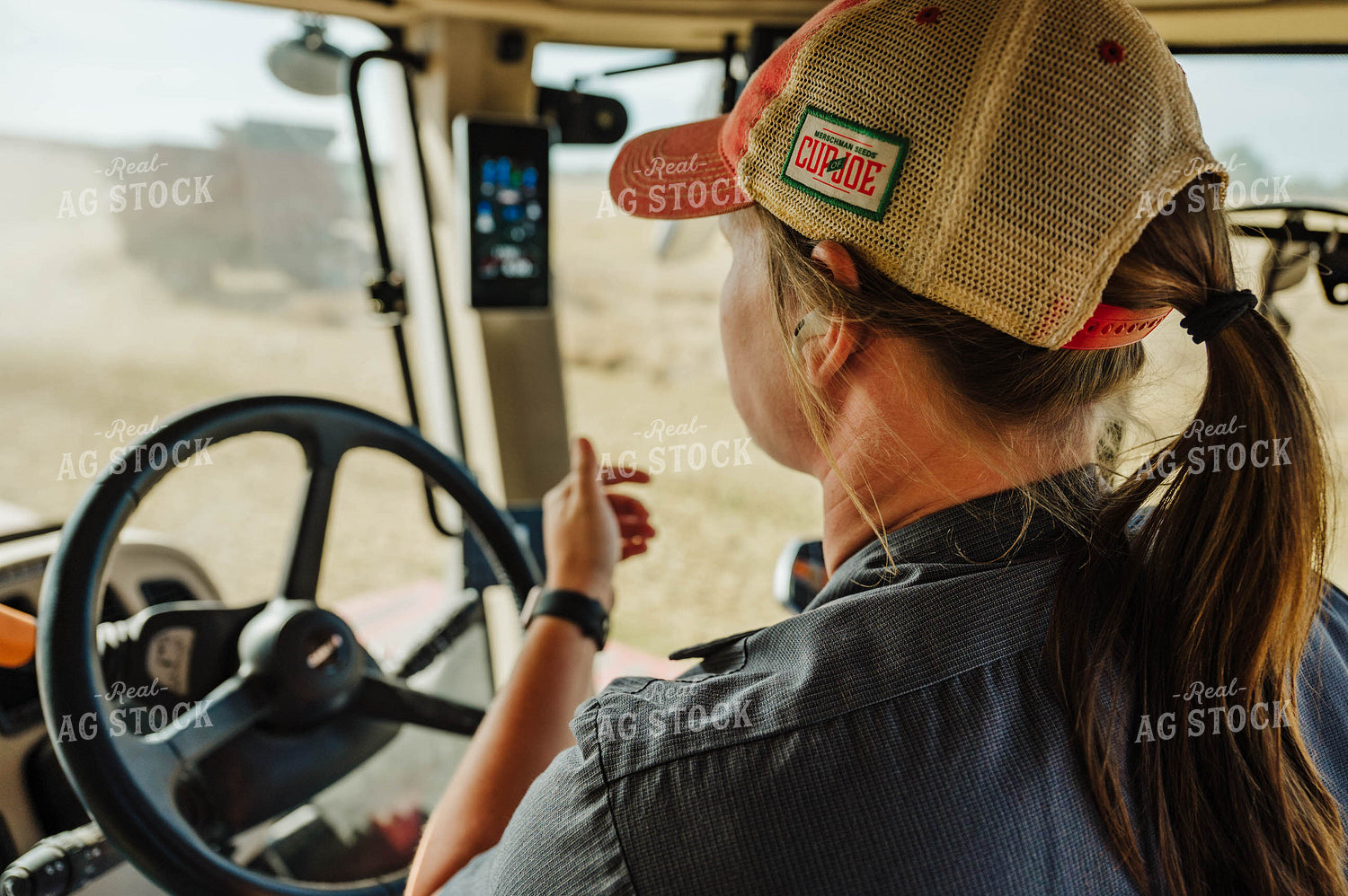 Female Farmer Driving Tractor 115220