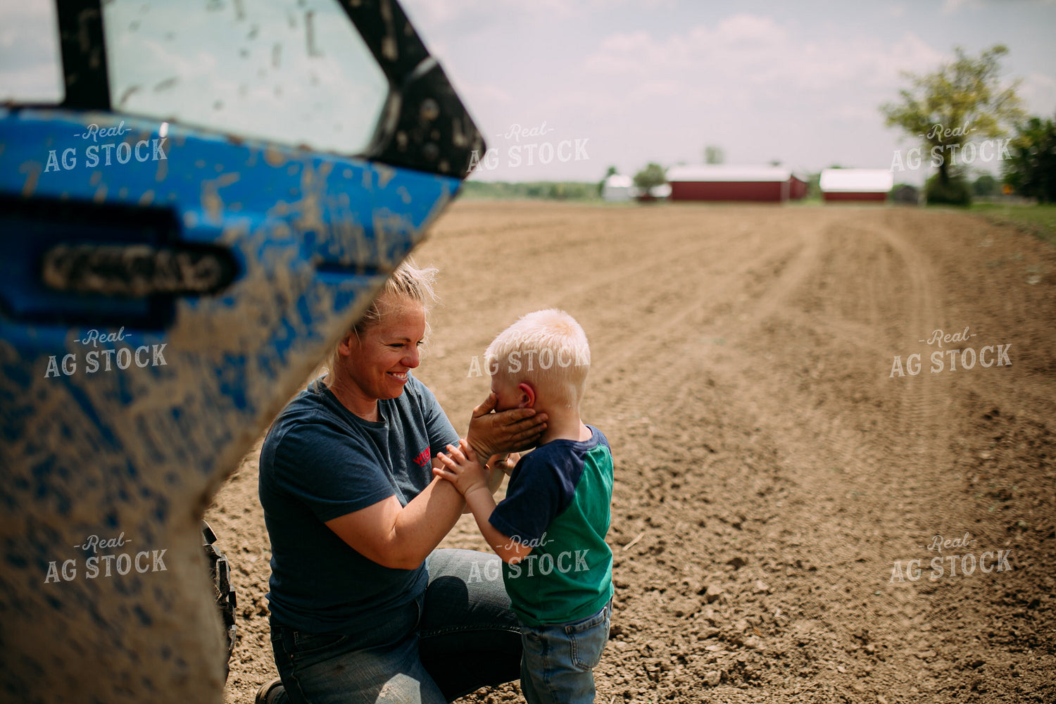 Farm Kid and Mom in Field 169094