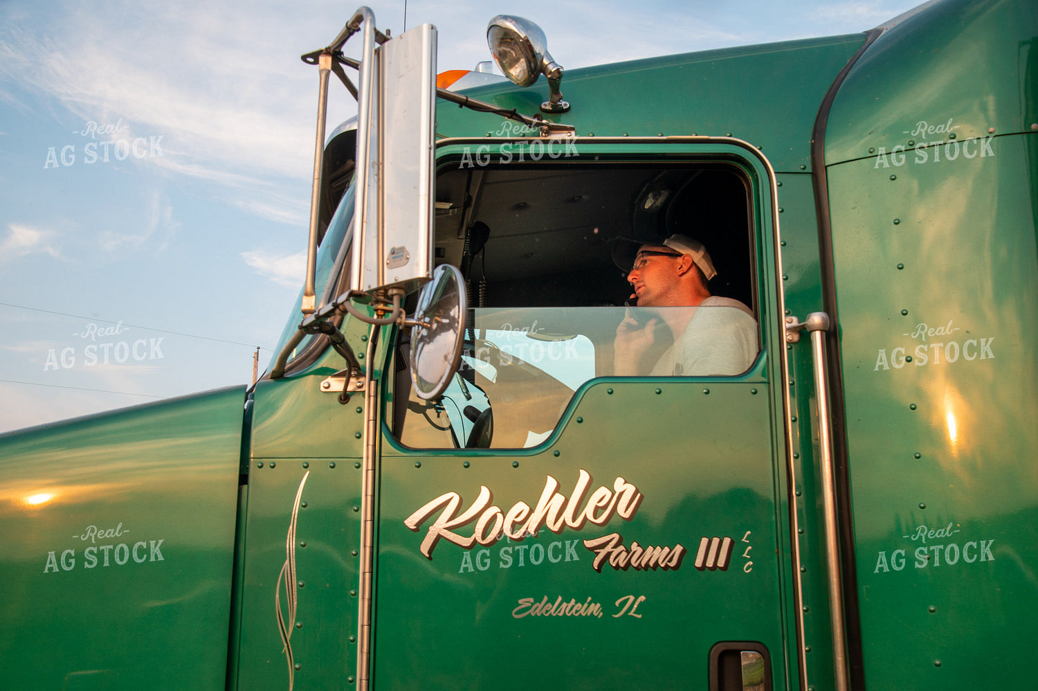Farmer Talking on the Phone in the Semi Cab 25478