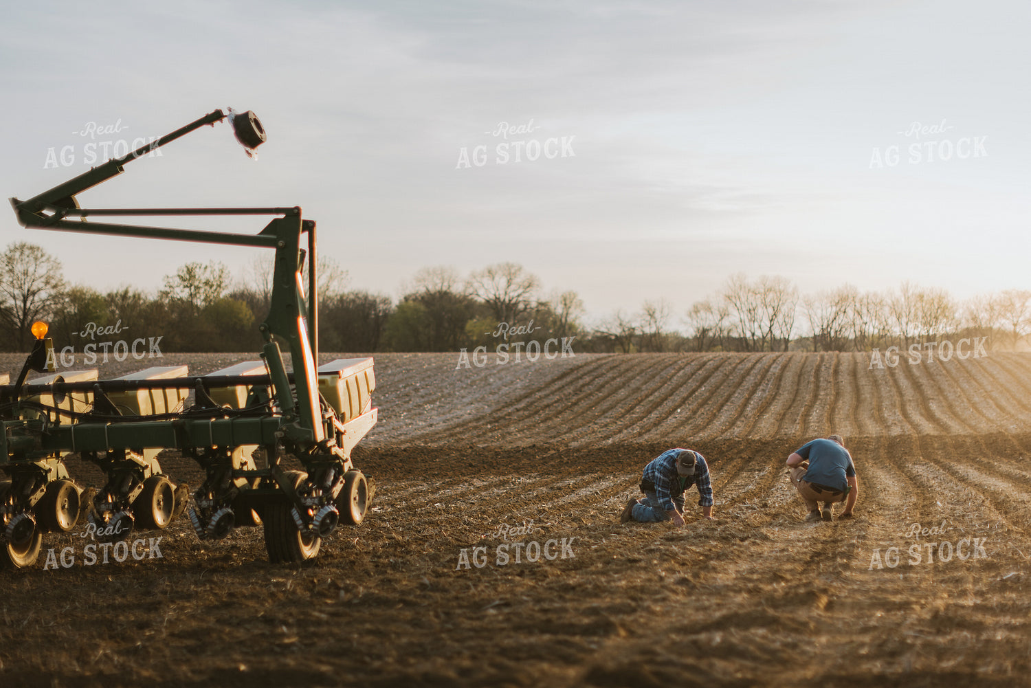 Farmers Checking Soil in Field 7447
