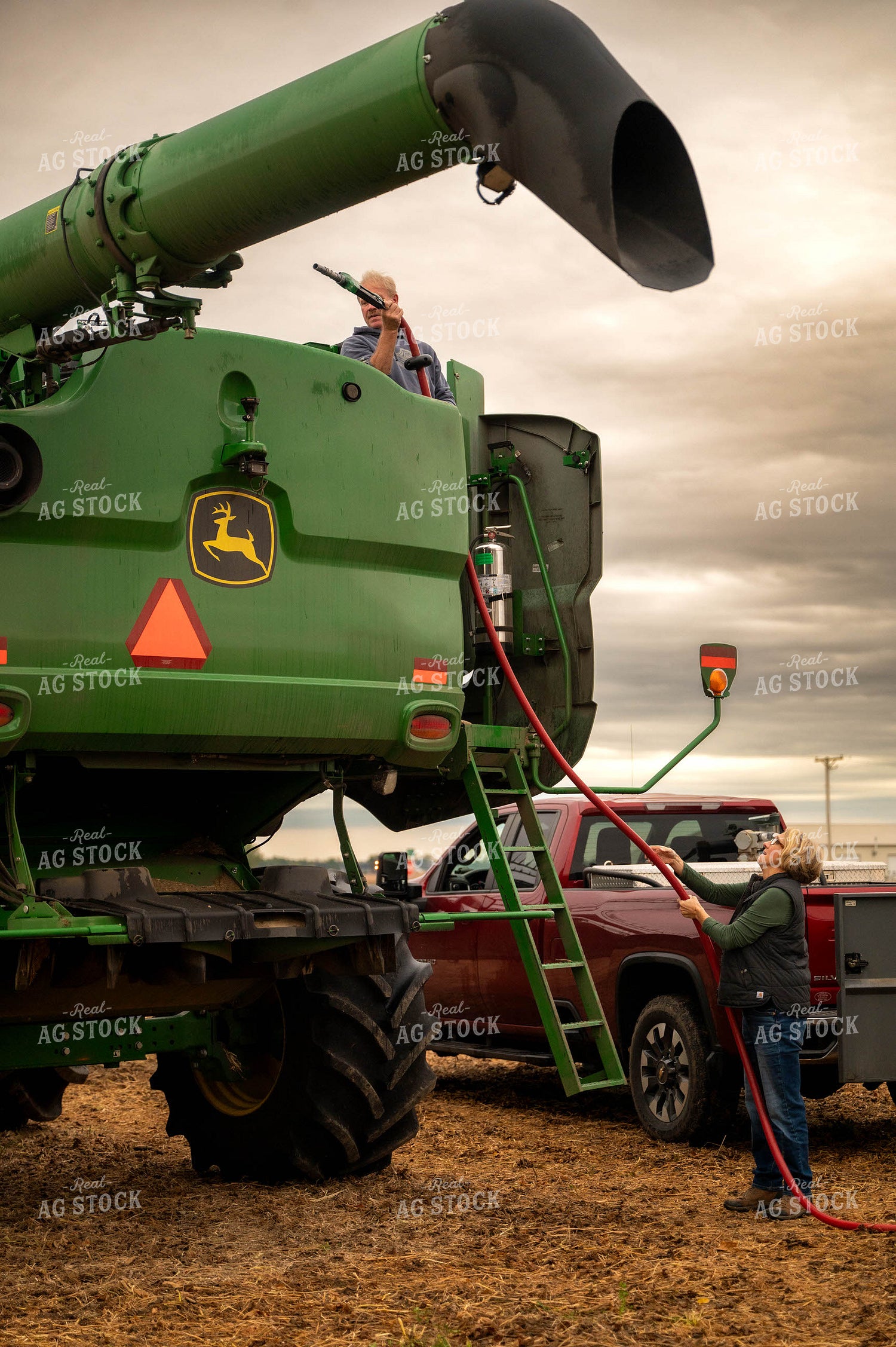 Farmers Fueling up Combine 115401