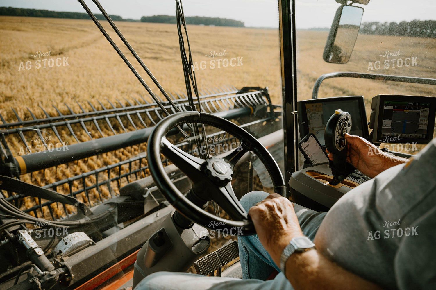 Farmer Operating Combine 125184