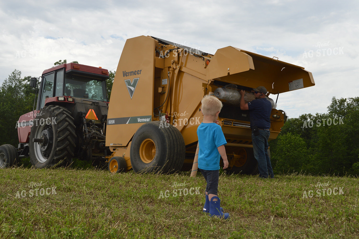 Farm Kid Watching Hay Baling 206037